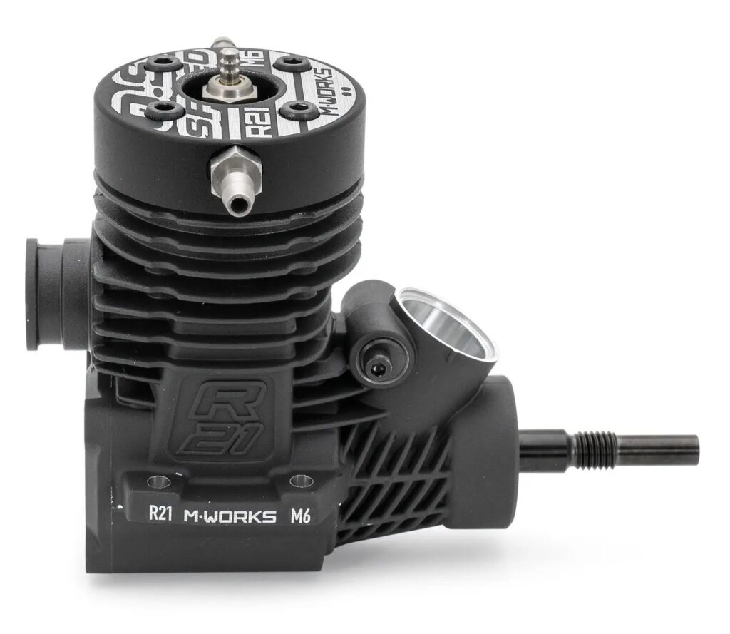 Mini moteur thermique en kit avec pistons, vilebrequin et pièces métalliques visibles